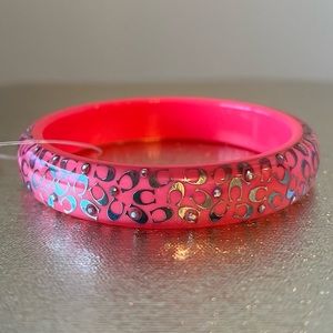 New Coach pink Bangle with silver colored inclusions and rhinestones acrylic NWT